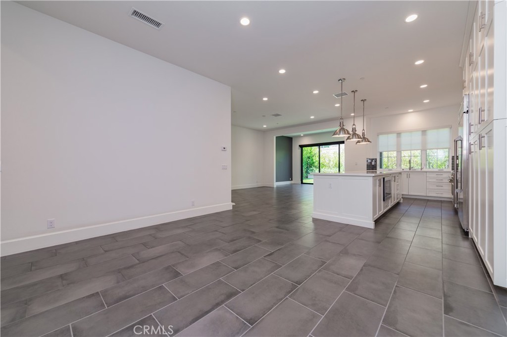 91 Rockinghorse Irvine, CA 92602 - Photo 7 of 48 a view of a kitchen with a sink and cabinets