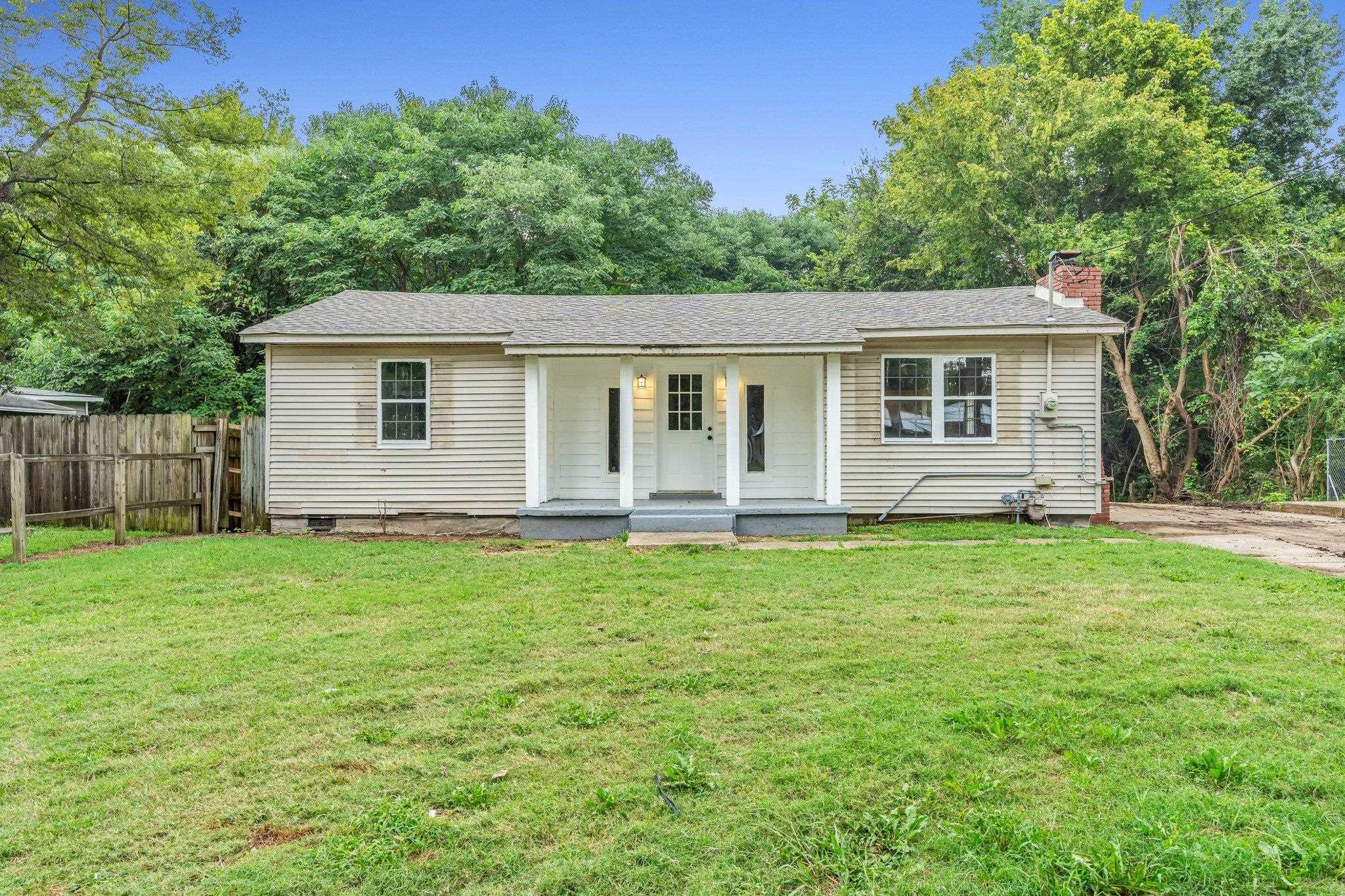 76 Bucksnort Road Covington, TN 38019 - Photo 1 of 21 View of front of home with a porch and a front yard