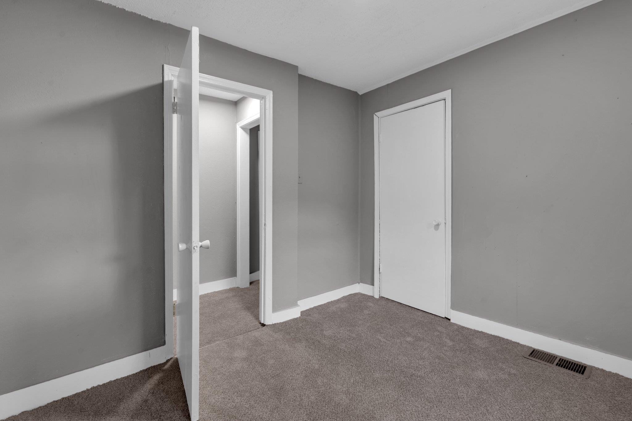 76 Bucksnort Road Covington, TN 38019 - Photo 14 of 21 Unfurnished bedroom with light colored carpet