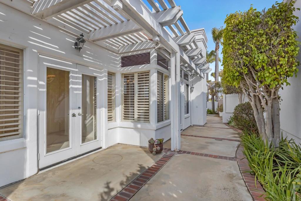 4144 Andros Way Oceanside, CA 92056 - Photo 25 of 29 a view of a pathway with a house