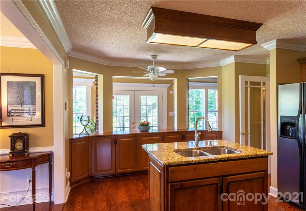178 Buck Fraley Road Cherryville, NC 28021 - Photo 27 of 47 a room with granite countertop a sink and a stove