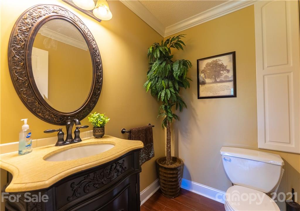 178 Buck Fraley Road Cherryville, NC 28021 - Photo 36 of 47 a bathroom with a sink and a mirror