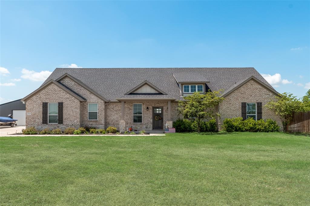 1705 Whitemound Road Sherman, TX 75090 - Photo 1 of 21 a front view of house with yard and green space