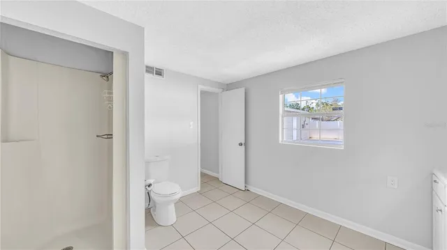 a bathroom with a toilet