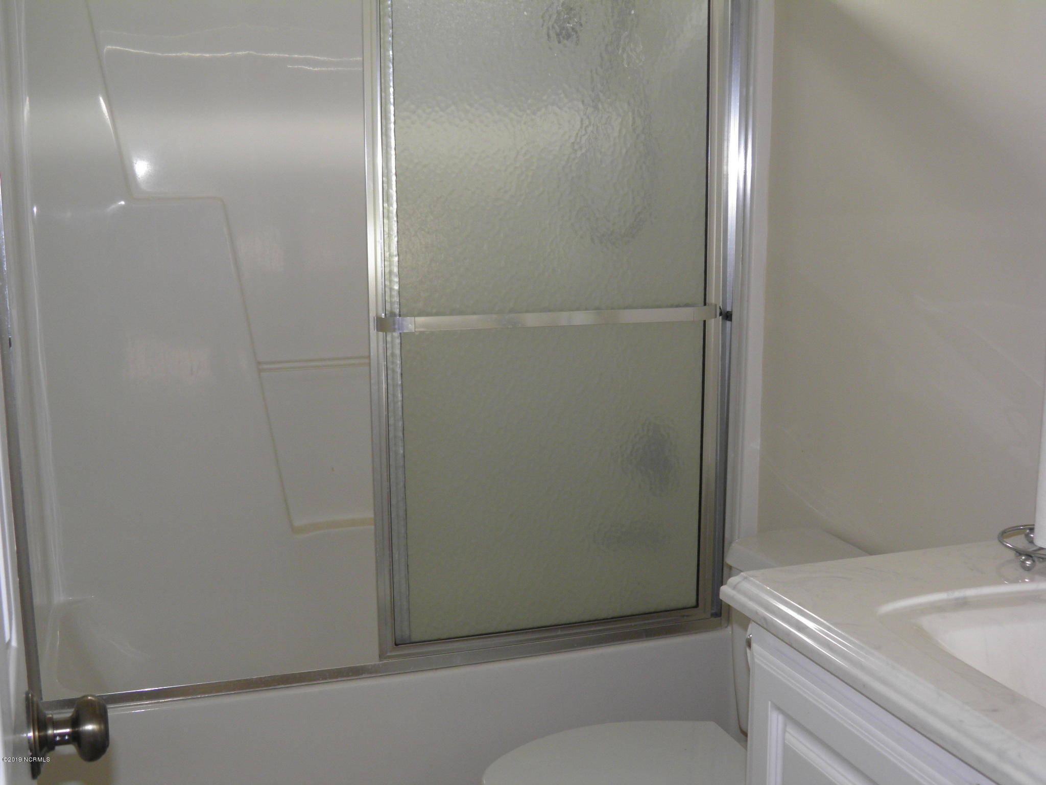 1700 Spring Pond Road Nashville, NC 27856 - Photo 8 of 19 Hall bath