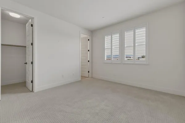 an empty room with a bathroom