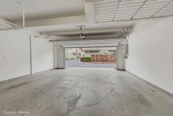 a view of a street with a building in the background