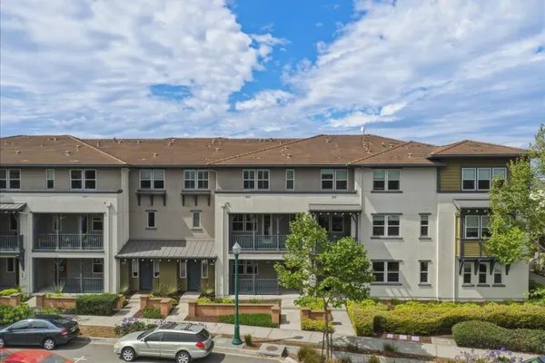 an aerial view of a city with lots of residential buildings