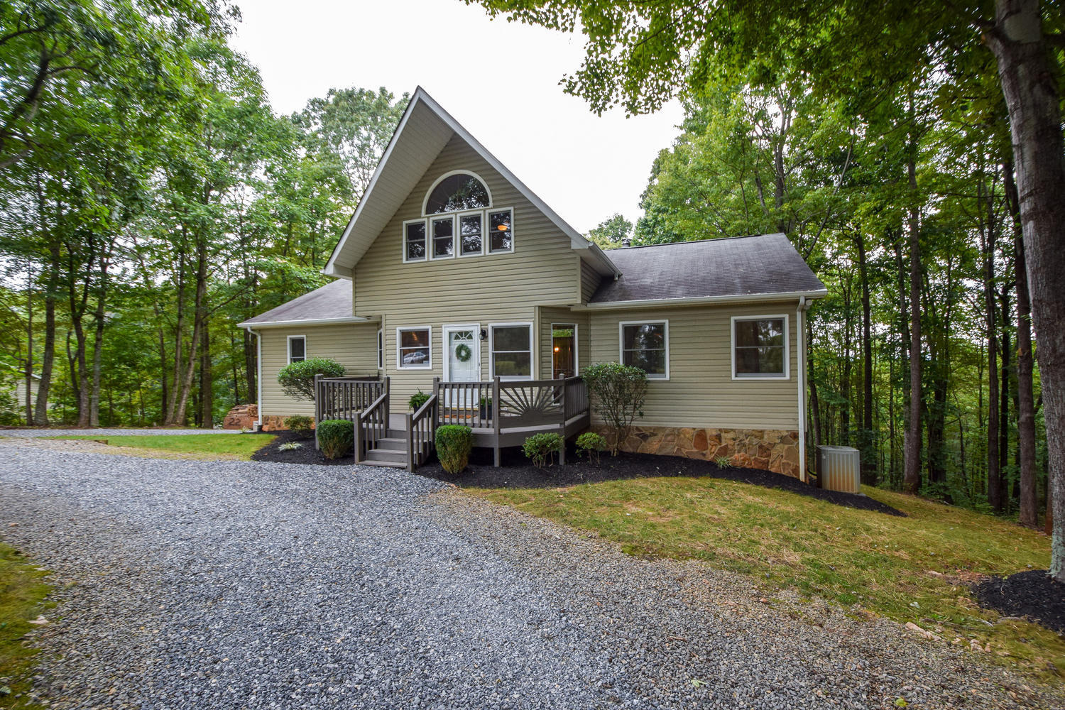 256 Deep Woods Road Hardy, VA 24101 - Photo 1 of 42 a view of a house with a yard and sitting area