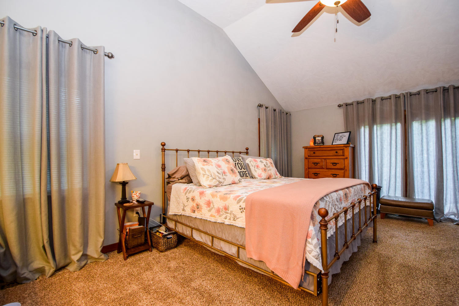 256 Deep Woods Road Hardy, VA 24101 - Photo 11 of 42 a bedroom with a bed and a chandelier