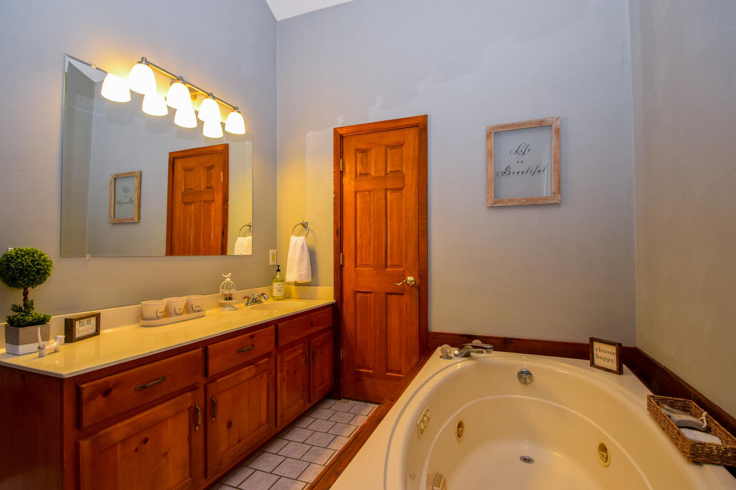 256 Deep Woods Road Hardy, VA 24101 - Photo 13 of 42 a bathroom with a tub sink and mirror