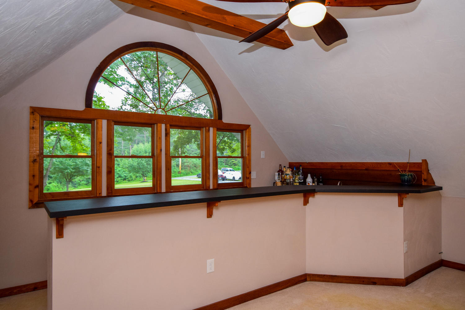 256 Deep Woods Road Hardy, VA 24101 - Photo 18 of 42 an empty room with windows and ceiling fan