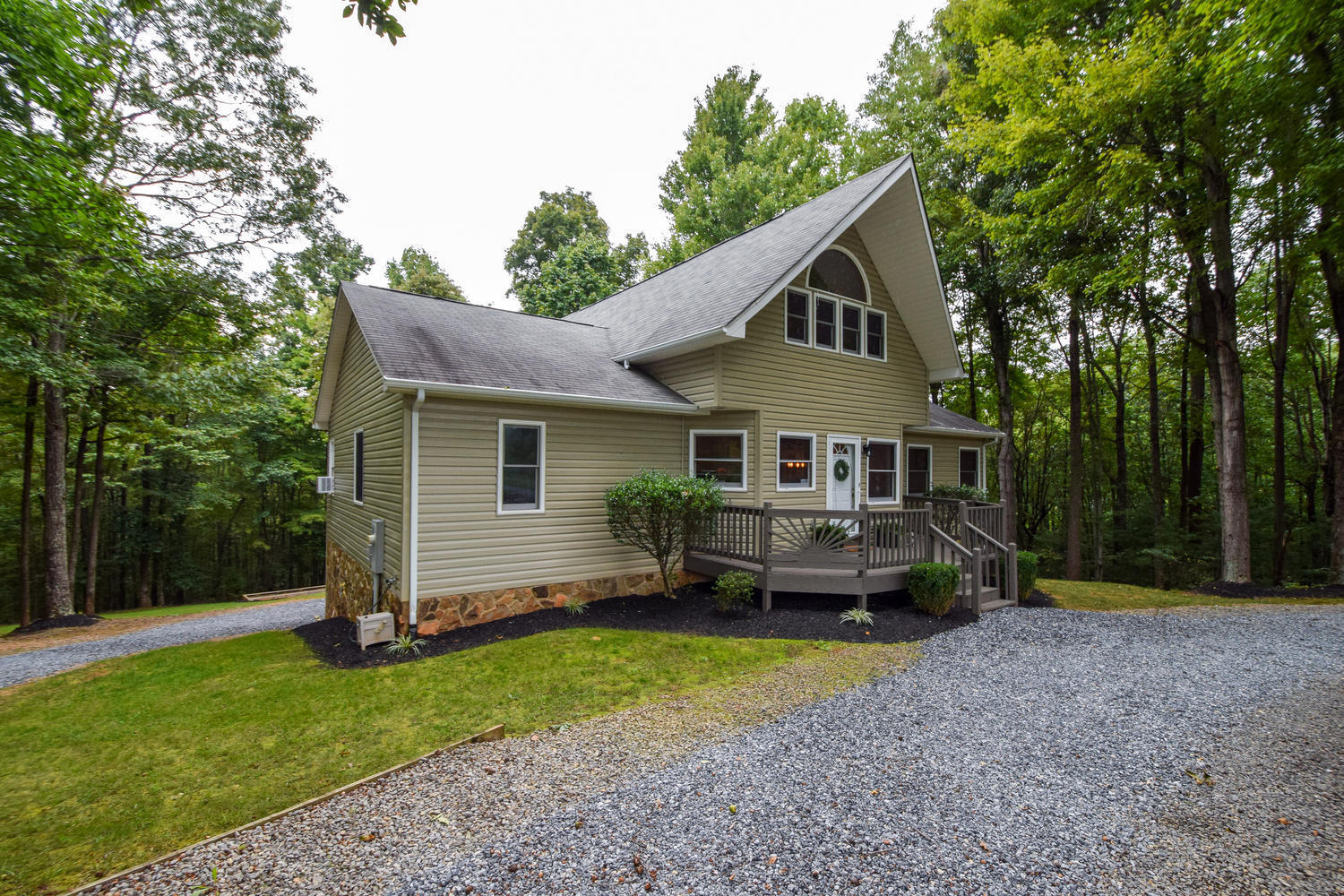 256 Deep Woods Road Hardy, VA 24101 - Photo 28 of 42 a front view of a house with a yard and trees