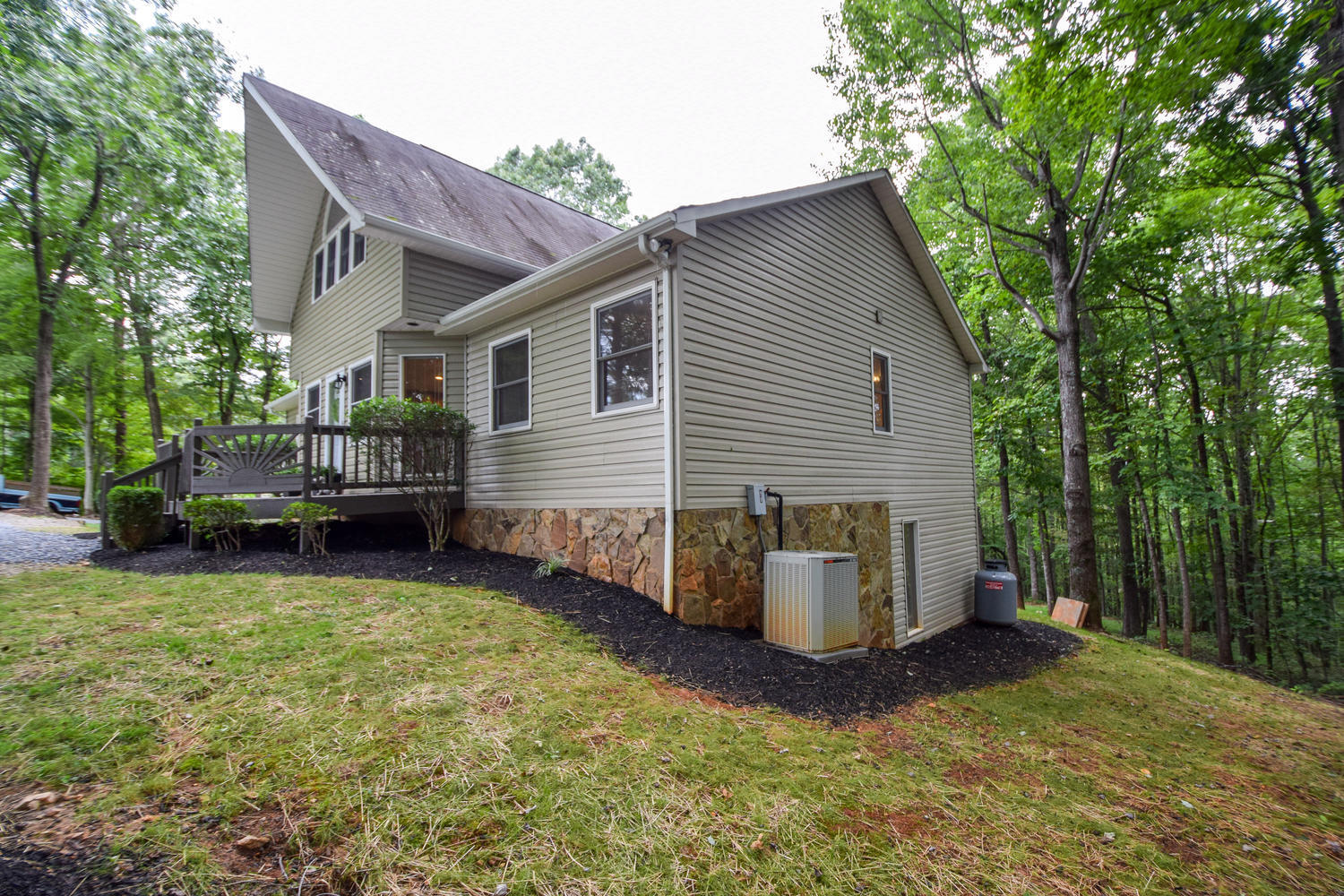 256 Deep Woods Road Hardy, VA 24101 - Photo 29 of 42 a view of a house with backyard and sitting area