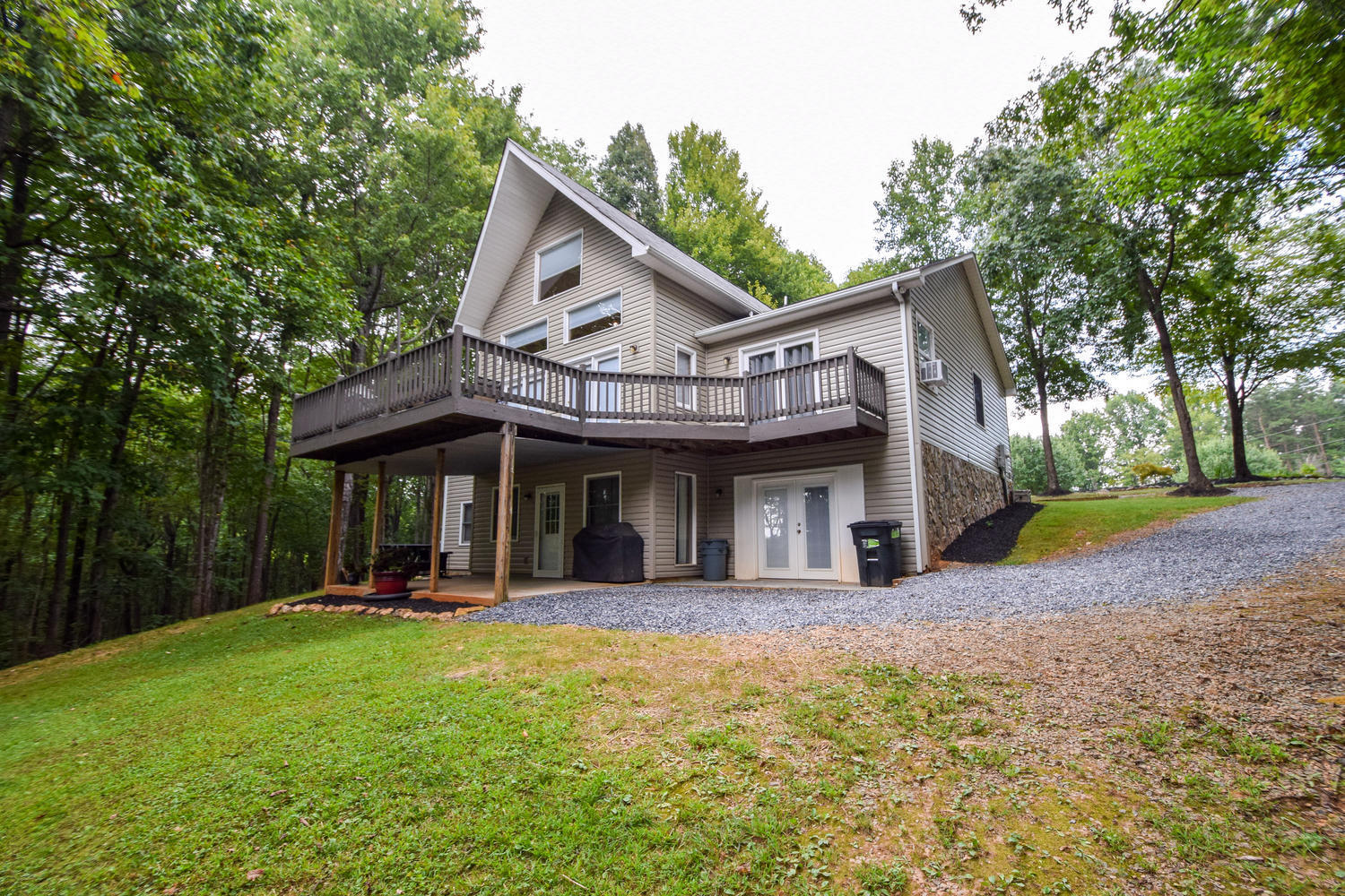 256 Deep Woods Road Hardy, VA 24101 - Photo 31 of 42 a view of a house with a yard and large tree