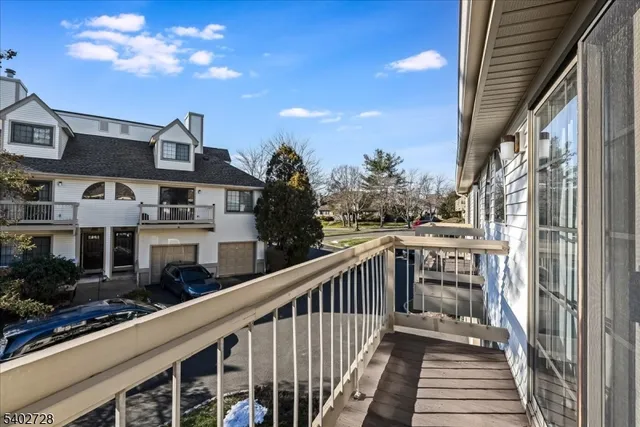 a view of a balcony with city view