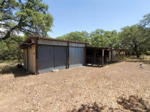 a house with trees in the background