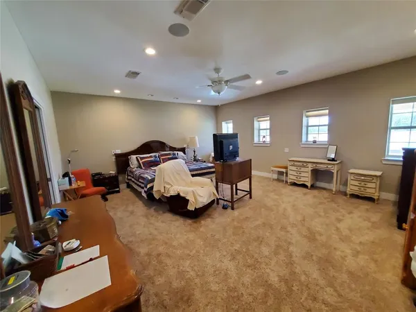 a room with furniture and a flat screen tv