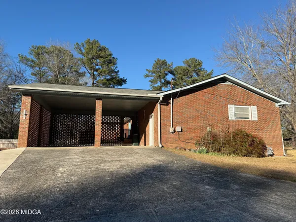 a view of a house with a garage