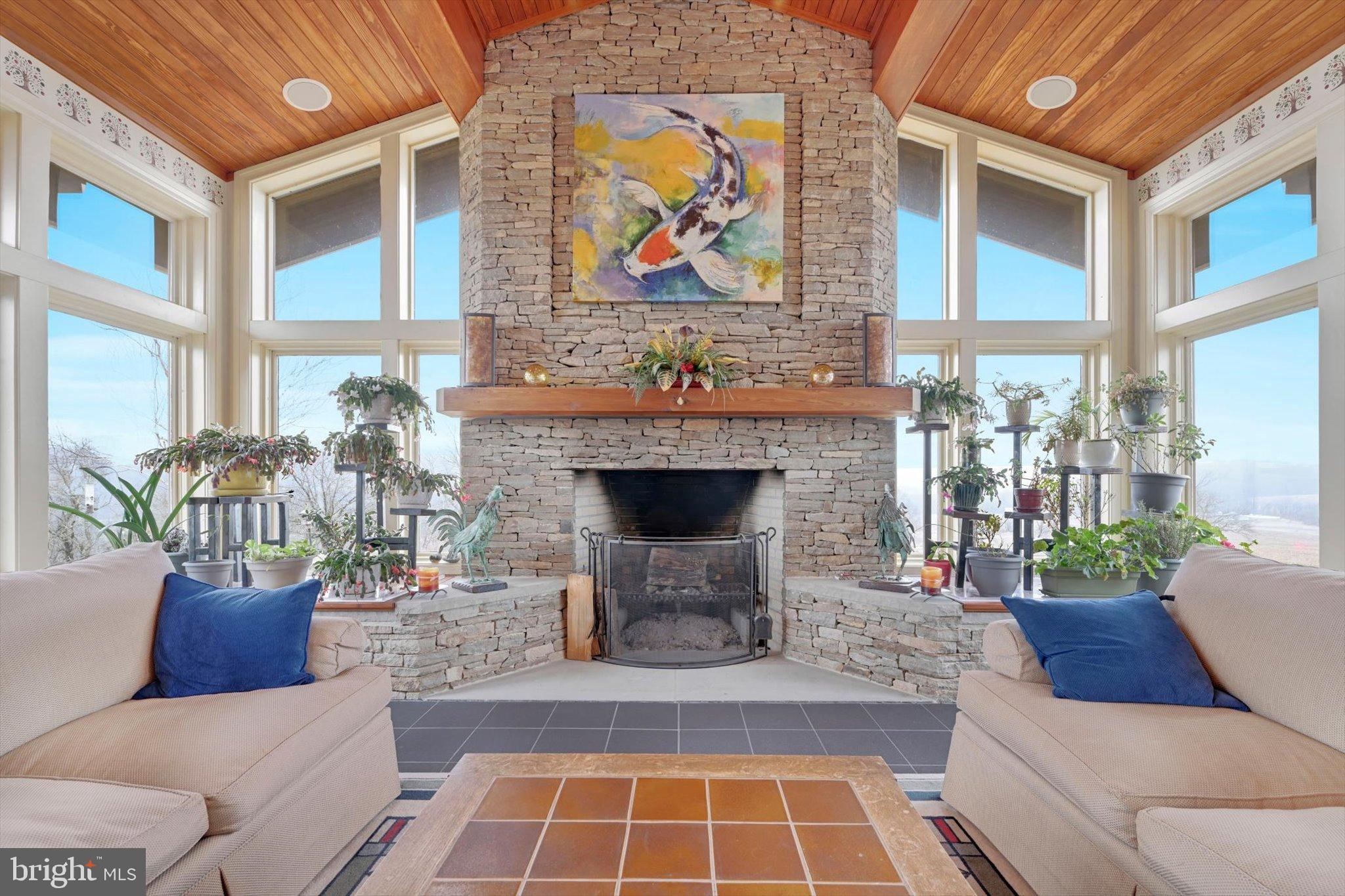 76 Zehner Road Landingville, PA 17972 - Photo 5 of 28 a view of a livingroom with furniture and a fireplace