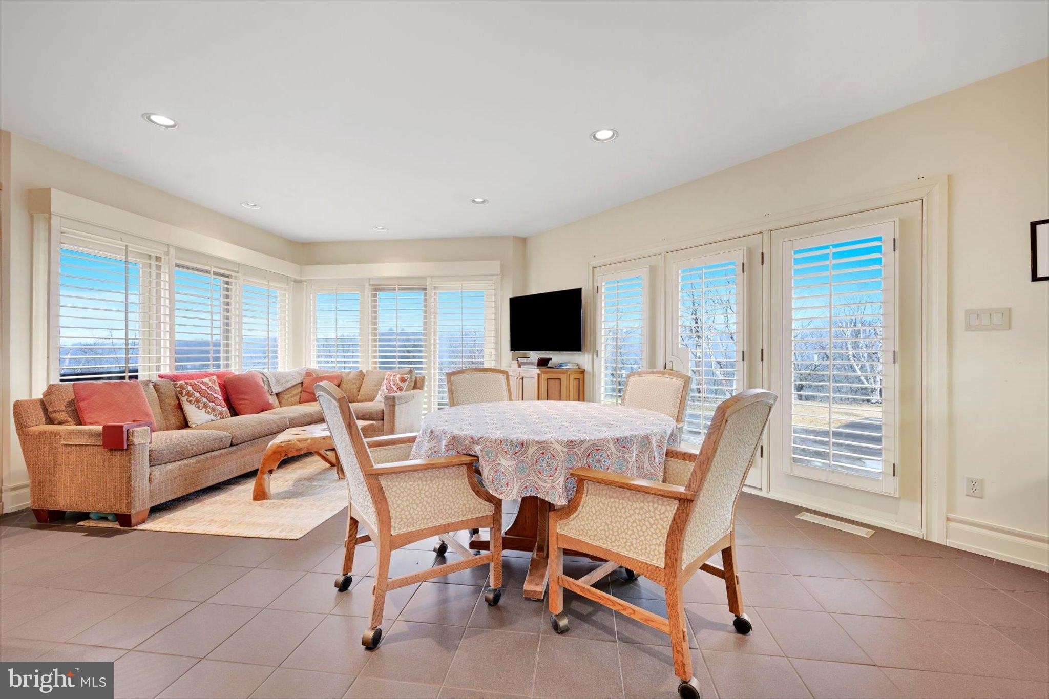 76 Zehner Road Landingville, PA 17972 - Photo 8 of 28 a living room with furniture and a flat screen tv
