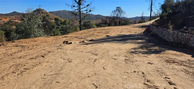 a view of a backyard of a house