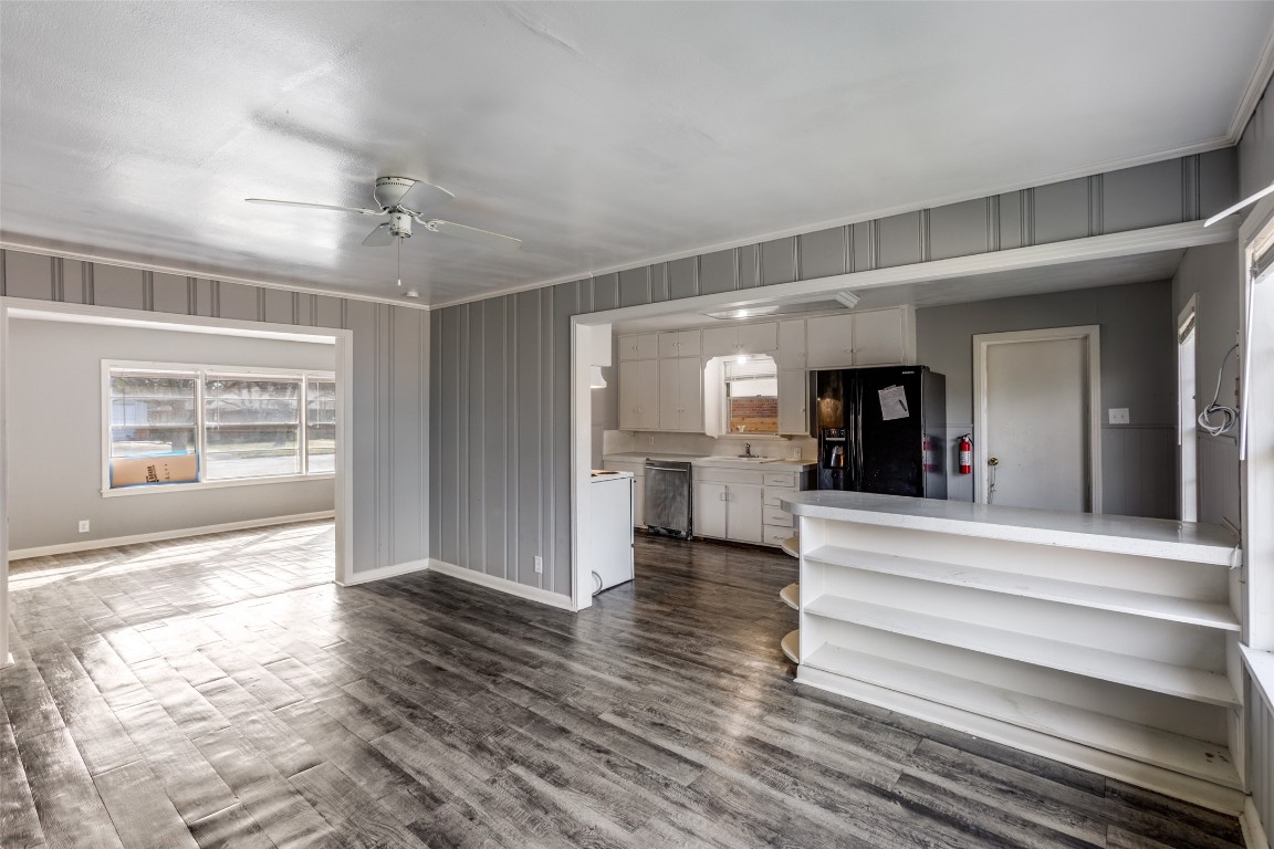 705 Campbell Street Lockhart, TX 78644 - Photo 11 of 30 a view of entryway and hall with wooden floor