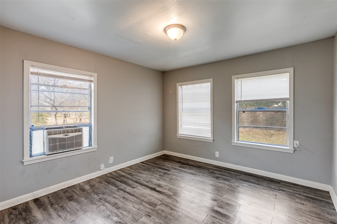 705 Campbell Street Lockhart, TX 78644 - Photo 17 of 30 a view of an empty room with a window