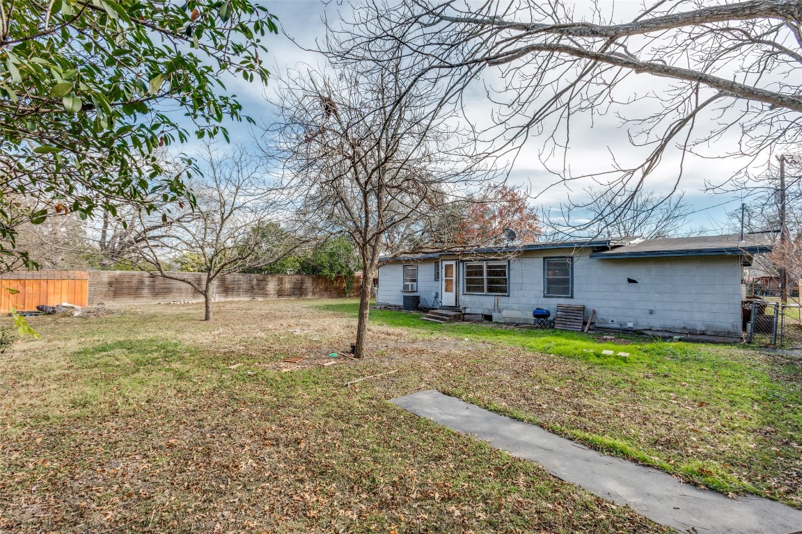 705 Campbell Street Lockhart, TX 78644 - Photo 22 of 30 a house view with a backyard space