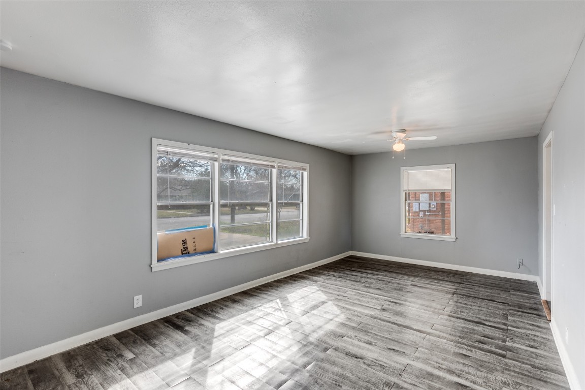 705 Campbell Street Lockhart, TX 78644 - Photo 7 of 30 a view of an empty room with a window