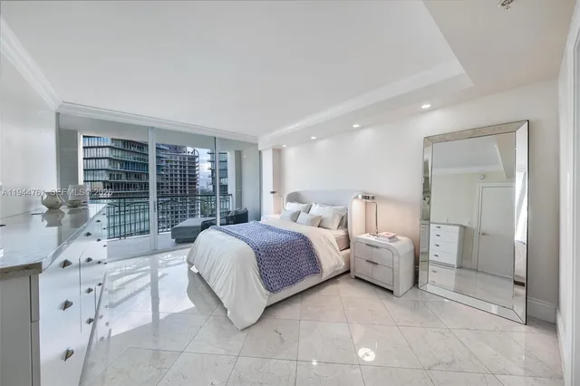 a spacious bathroom with a double vanity sink mirror and shower