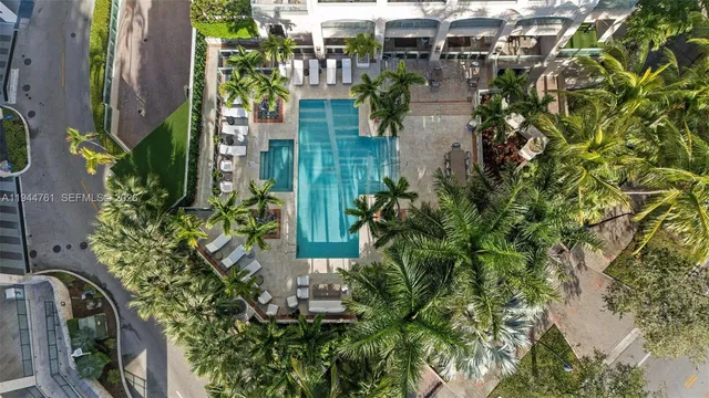 a view of a lake with beach and outdoor space