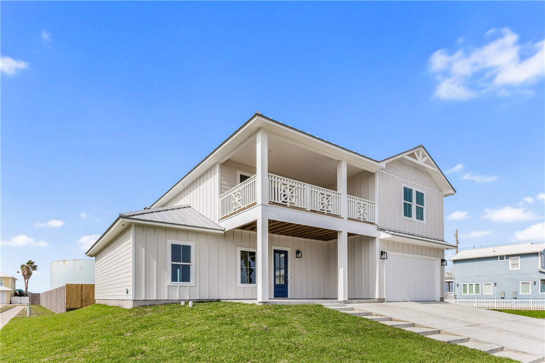 129 Frontside Drive Corpus Christi, TX 78373 - Photo 1 of 21 a front view of a house with a yard