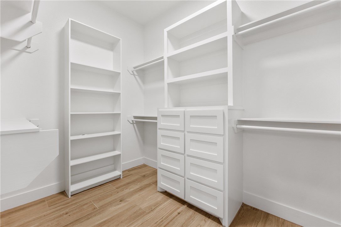 129 Frontside Drive Corpus Christi, TX 78373 - Photo 13 of 21 a view of walk in closet with empty racks
