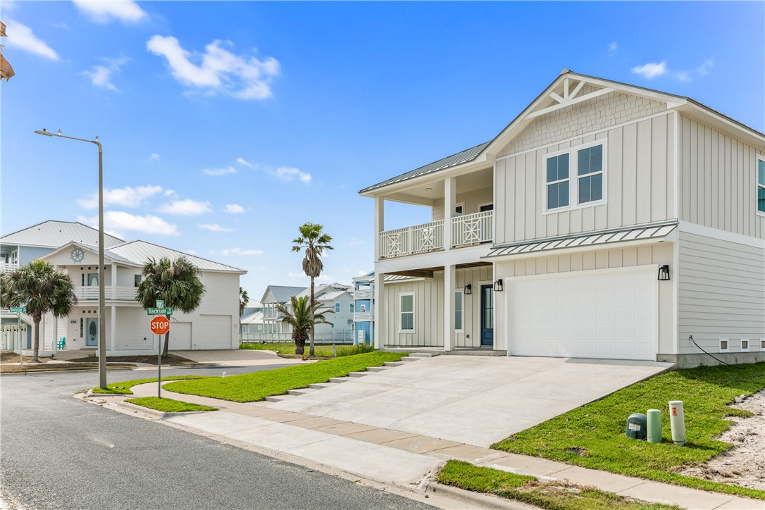 129 Frontside Drive Corpus Christi, TX 78373 - Photo 2 of 21 a front view of a house with a yard
