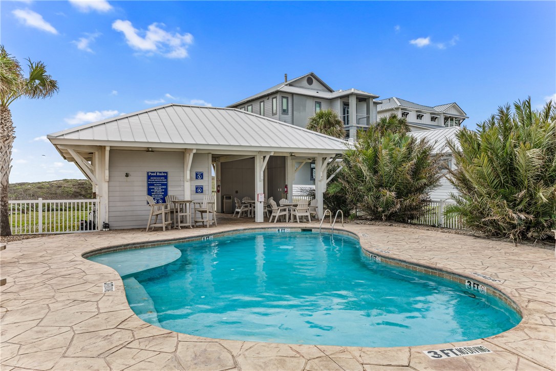 129 Frontside Drive Corpus Christi, TX 78373 - Photo 4 of 21 a view of a house with swimming pool and sitting area