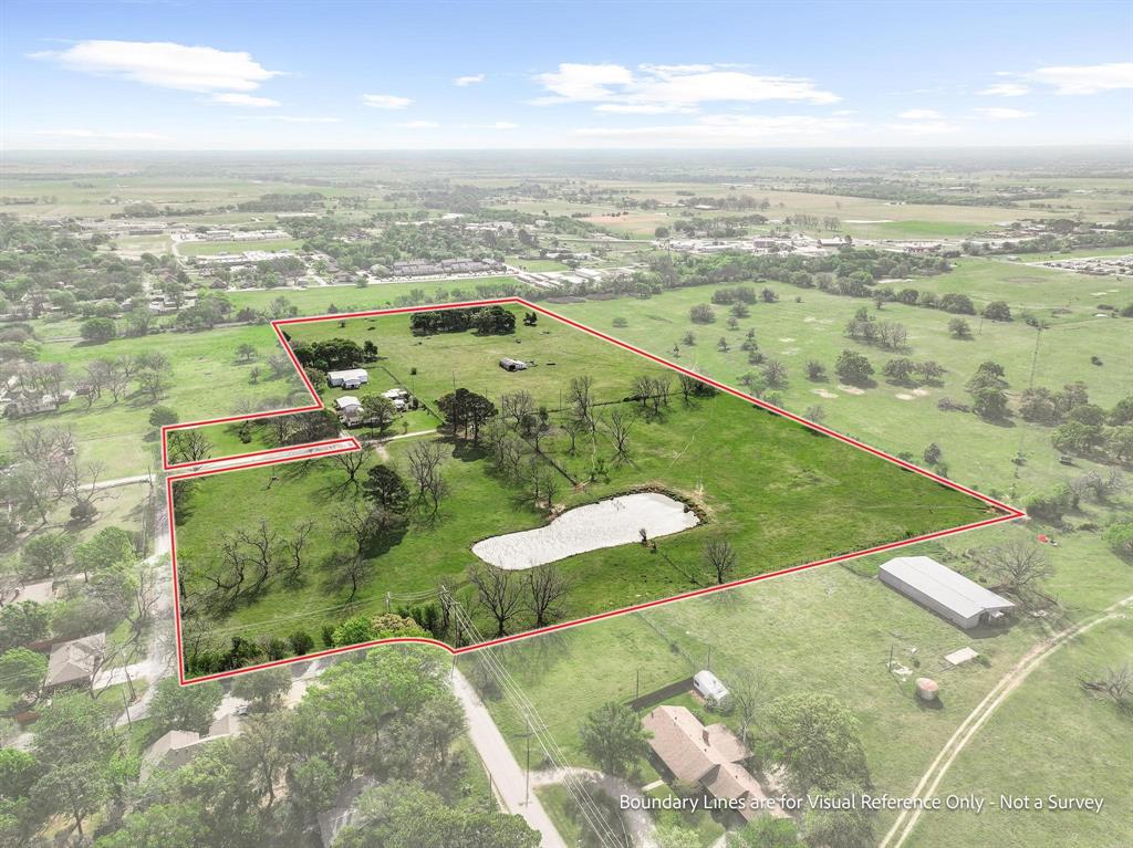 819 South Morrison Street Pilot Point, TX 76258 - Photo 3 of 12 an aerial view of residential houses with outdoor space