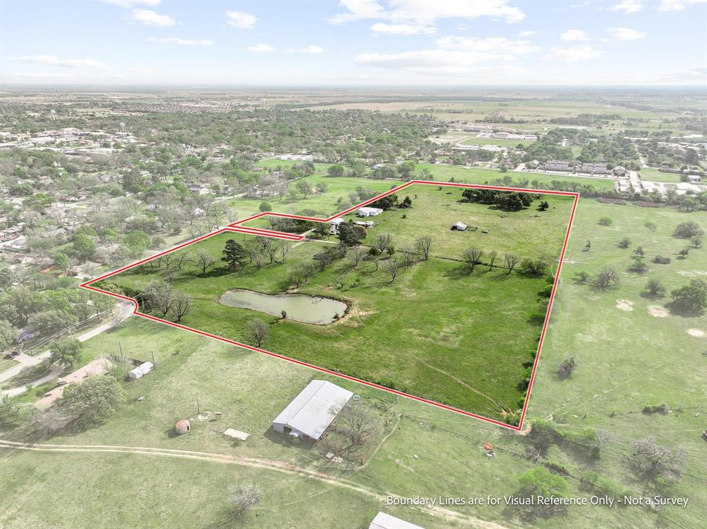 819 South Morrison Street Pilot Point, TX 76258 - Photo 7 of 12 an aerial view of residential houses with outdoor space