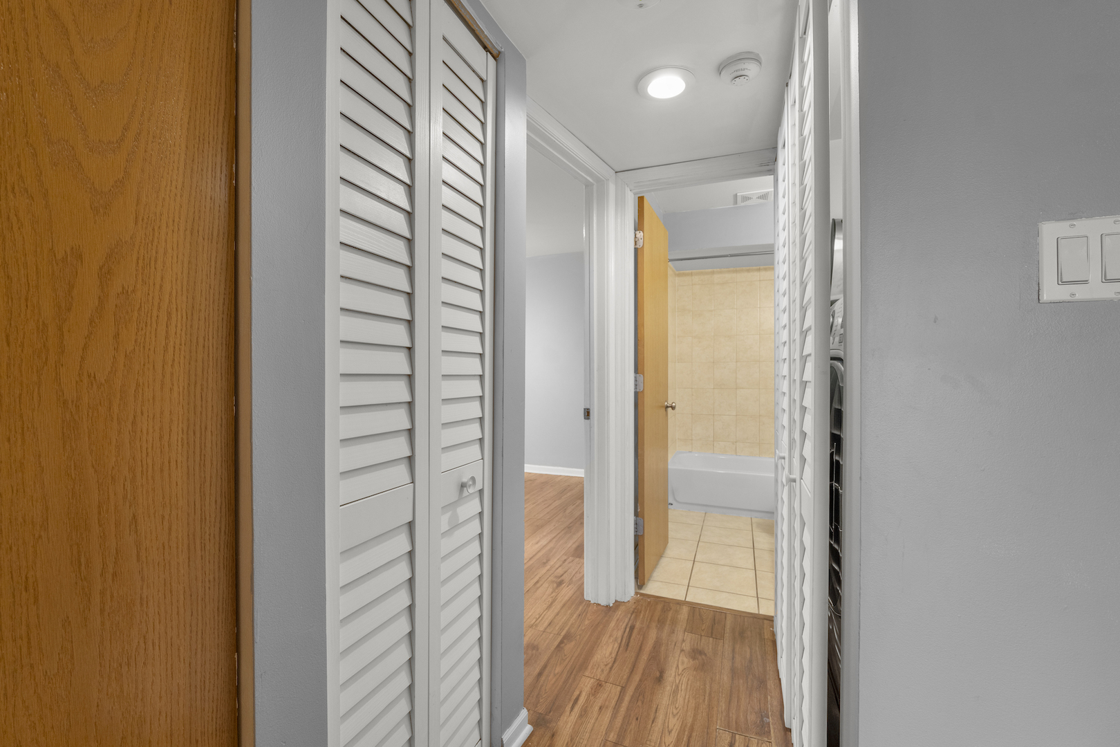 10440 Brooks Lane, Unit B4 Chicago Ridge, IL 60415 - Photo 11 of 14 a bathroom with a glass door shower and a bathroom