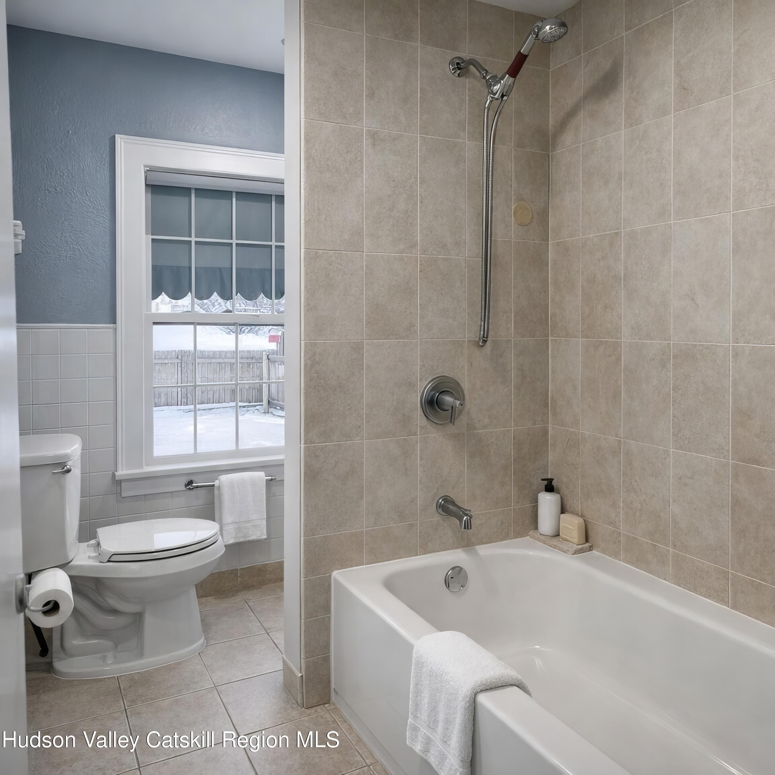 586 Old Rte 23 Cairo, NY 12405 - Photo 12 of 16 a bathroom with a sink toilet and shower