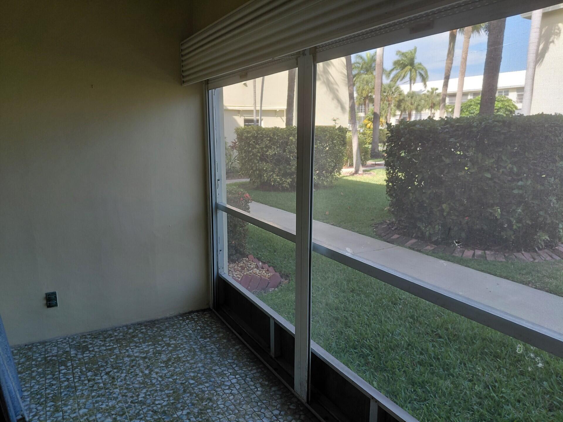 1951 Northeast 39th Street, Unit 127 Lighthouse Point, FL 33064 - Photo 21 of 35 LPGN #127 porch