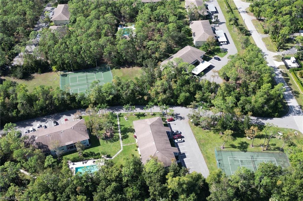 5675 Whitaker Road, Unit B101 Naples, FL 34112 - Photo 29 of 45 an aerial view of house with yard