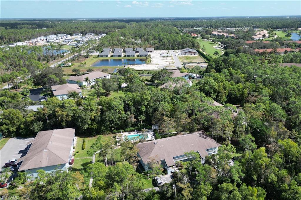 5675 Whitaker Road, Unit B101 Naples, FL 34112 - Photo 43 of 45 an aerial view of multiple house