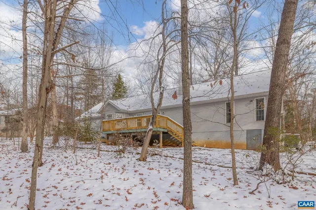 a house with trees in front of it