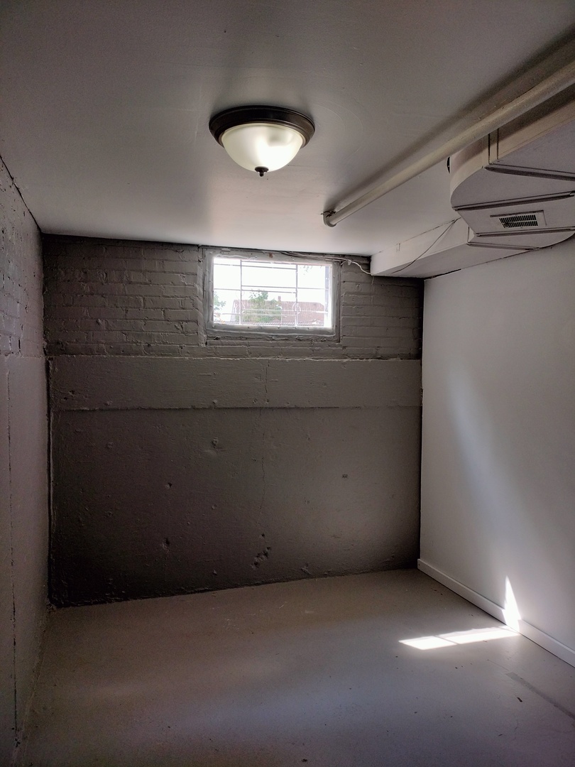 7910 South Muskegon Avenue, Unit 3 Chicago, IL 60617 - Photo 14 of 17 a view of empty room