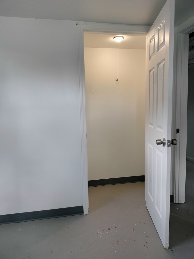 7910 South Muskegon Avenue, Unit 3 Chicago, IL 60617 - Photo 16 of 17 a view of an empty room