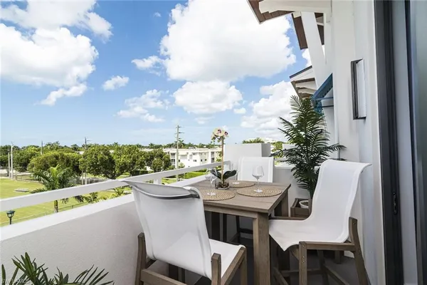 a dining table with chairs and a table