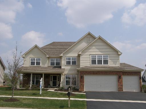 S589 Ellithorp Lane Geneva, IL 60134 - Photo 1 of 1 a front view of a house with a yard