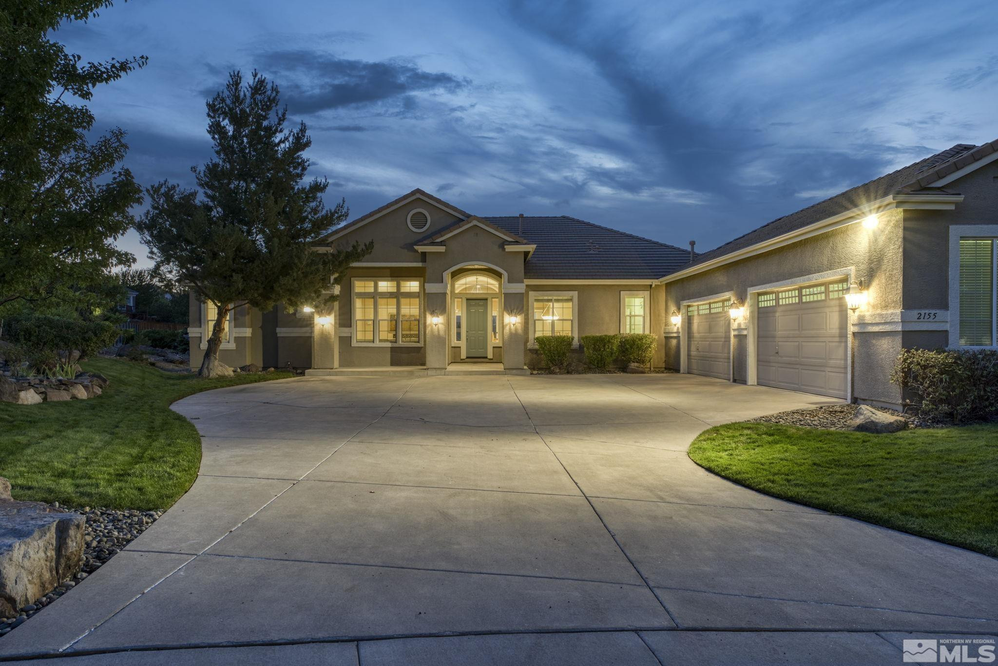 2155 Kingman Court Reno, NV 89511 - Photo 1 of 2 a front view of a house with a yard
