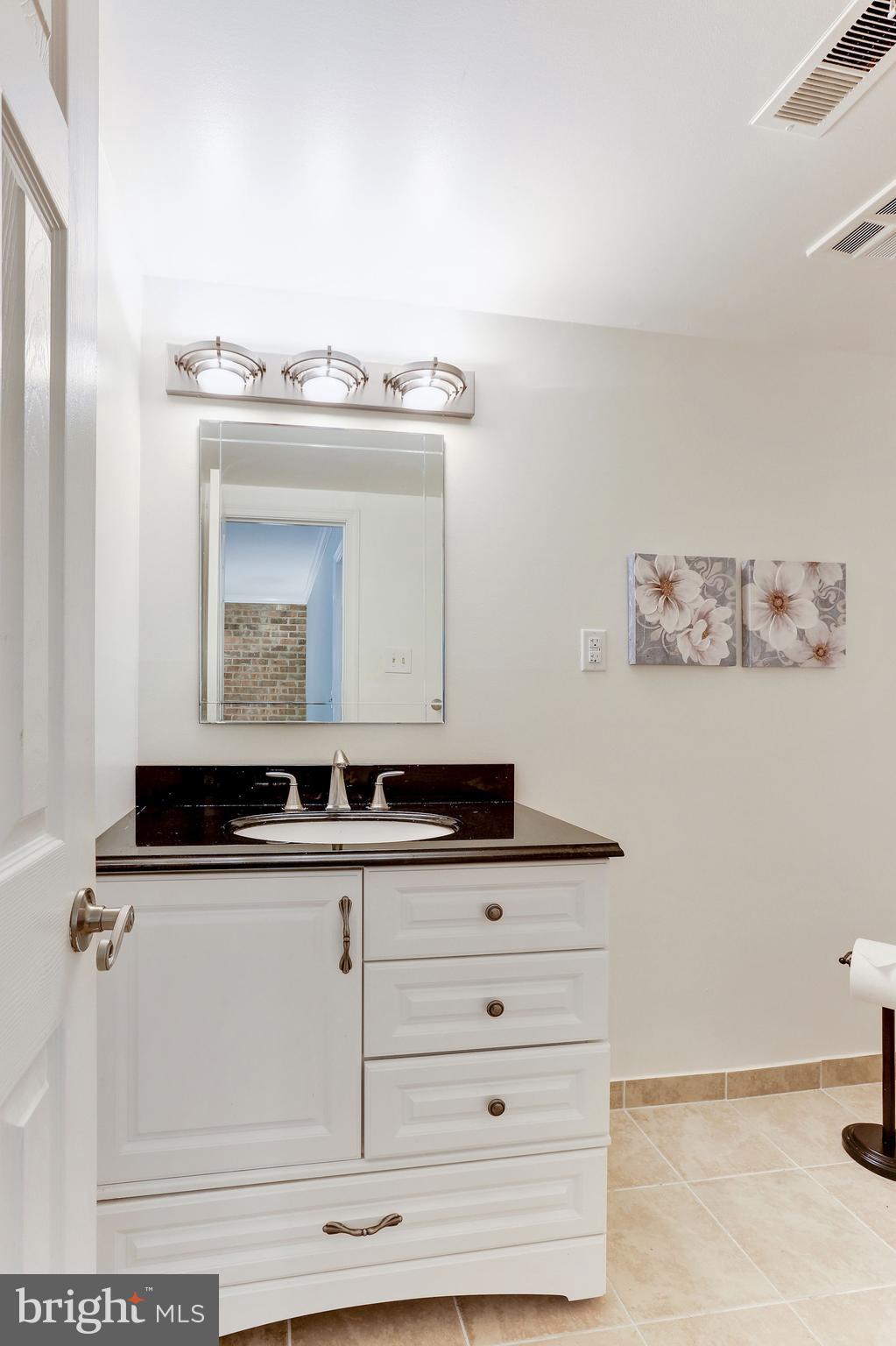 12335 Coleraine Court Reston, VA 20191 - Photo 50 of 84 Half Bathroom - Beautifully Upgraded & Spacious